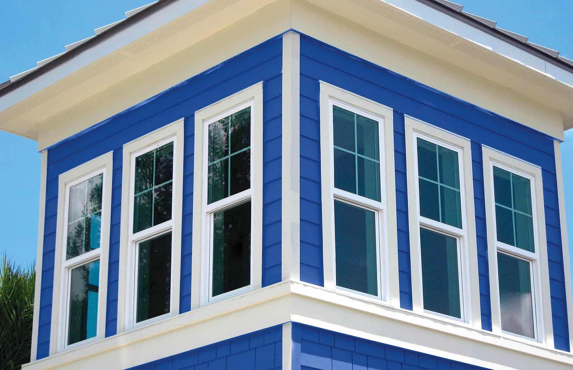 Hurricane-resistant glass windows are an expensive option but among the best. There is not obstruction aesthetically and the result is permanent and convenient. 